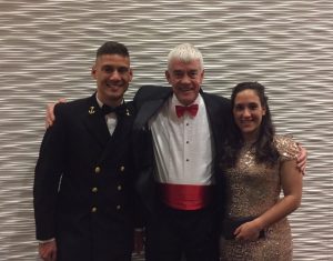 Chris Caporali, Dr. Stafford, and Emily Caporali in formal wear