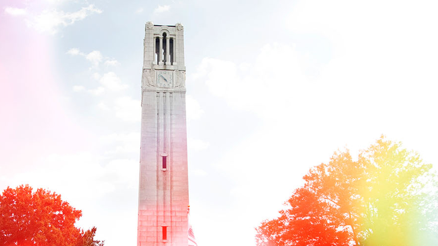 A rainbow-hued shot of the NC State Belltower.