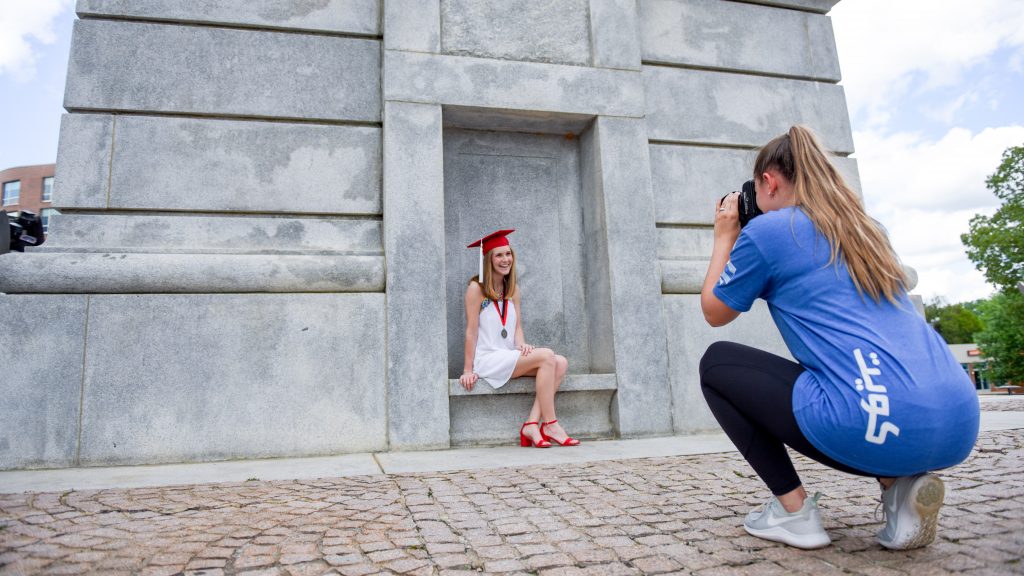Student takes photos at Belltower