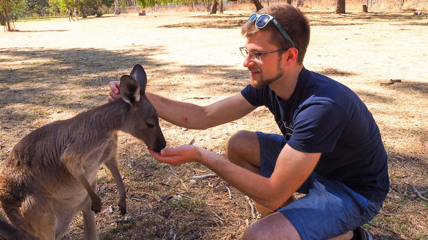 Jakub Sciora feeding a wallaby